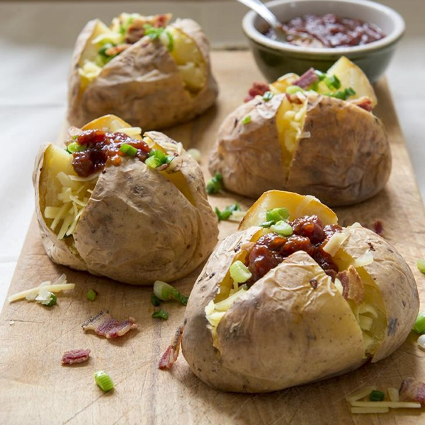 Baked potato with grated cheddar and Ballymaloe Country Relish